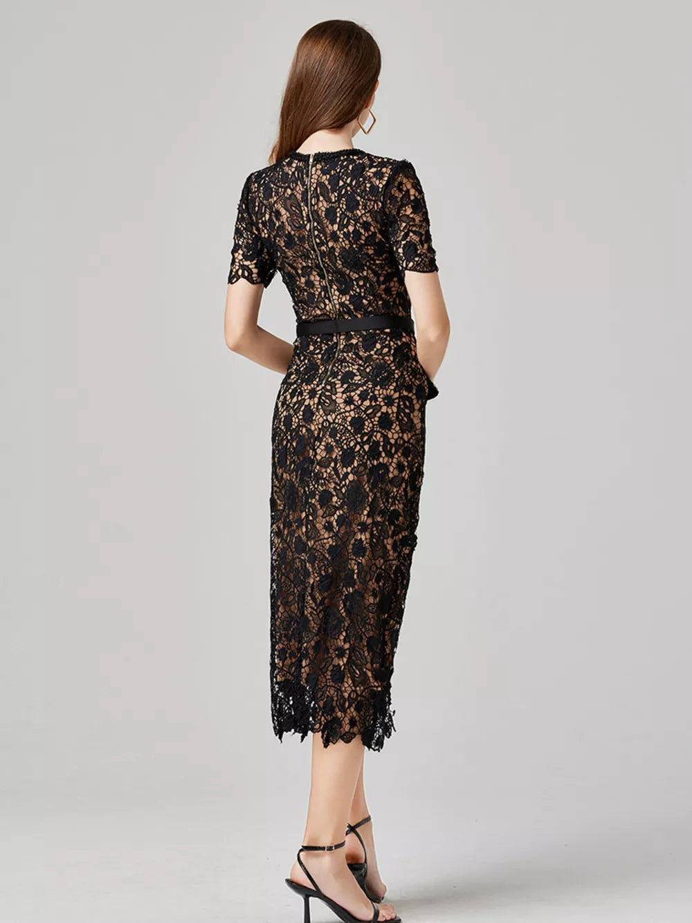 Black lace midi dress with short sleeves, a belted waist, and a zipper closure.