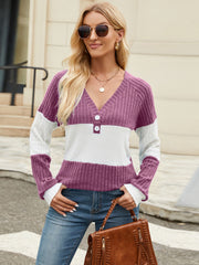 Ribbed Henley colorblock knit sweater with V-neck and button detail.