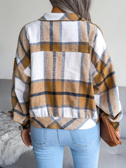 Oversized tartan shacket in camel and white with buttoned front and patch pockets.