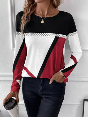 Geometric panel long sleeve t-shirt in black, white, and scarlet with chevron detail.