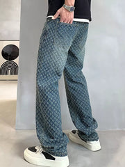 Relaxed fit blue denim jeans with a textured pattern and vintage wash.