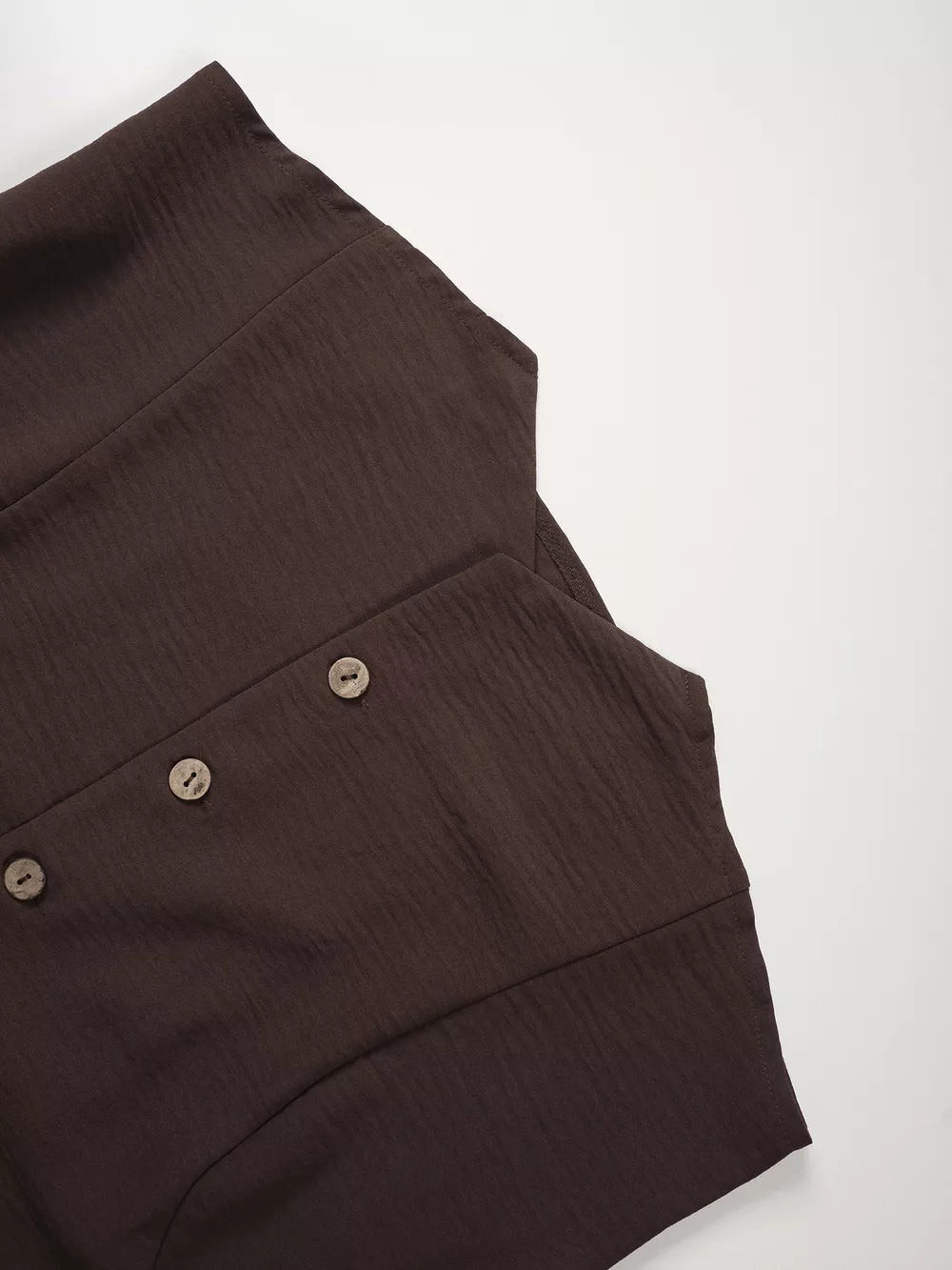 Chocolate cropped vest with textured fabric and button detail