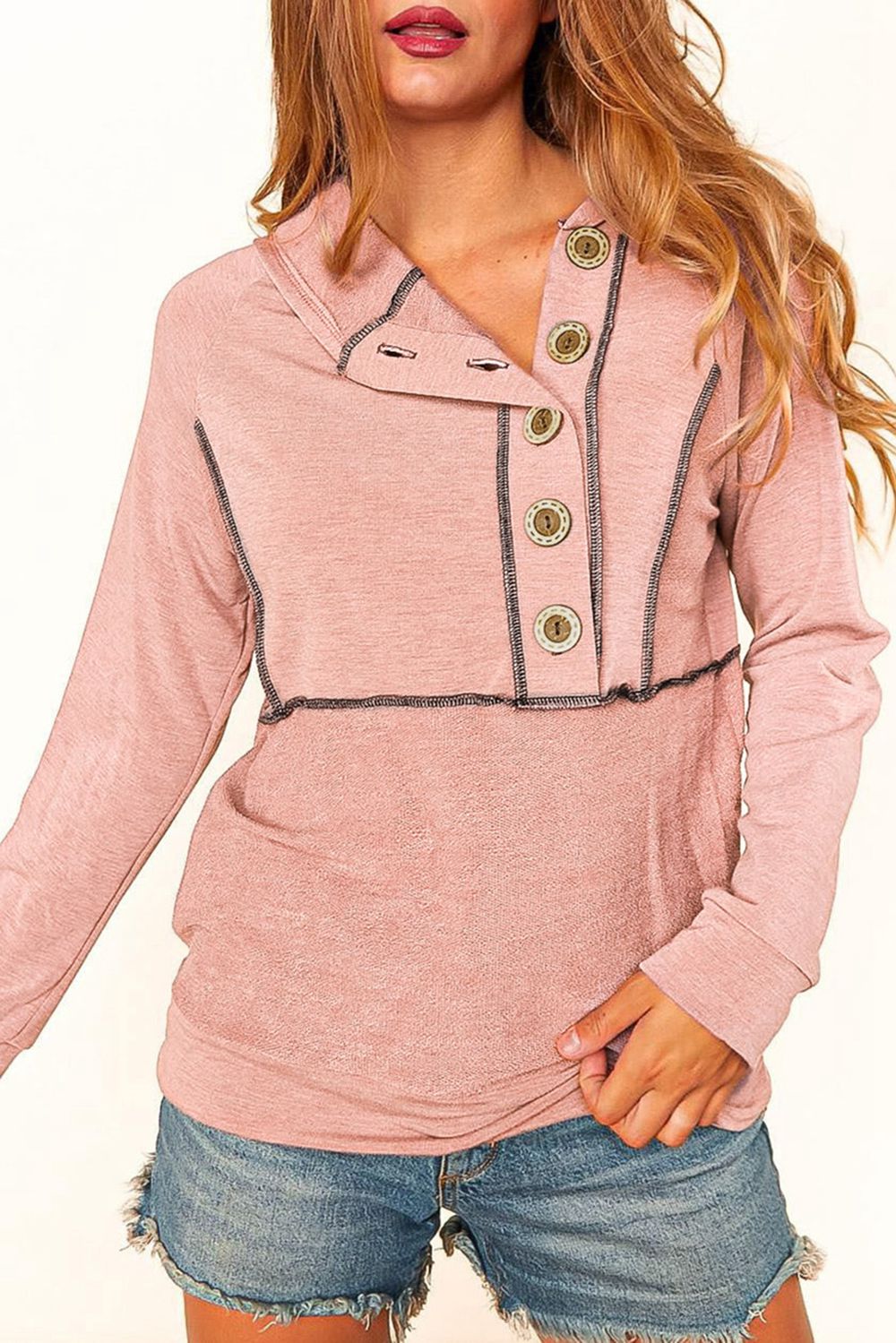 Dusty pink knit henley hoodie with contrast stitching and button detail