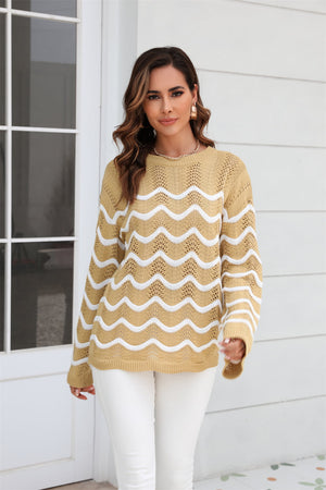 Khaki openwork sweater with white wavy stripes and crew neck.
