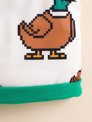 Baby white cotton tee with pixelated duck graphic and green trim.