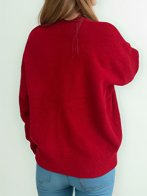 Burgundy oversized crewneck knit pullover sweater with ribbed cuffs and hem.