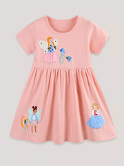 Pink cotton toddler dress with fairy appliqués and embroidered details.