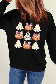 Black crewneck sweatshirt with a grid of cute Halloween ghosts and pumpkins with pink bows graphic.