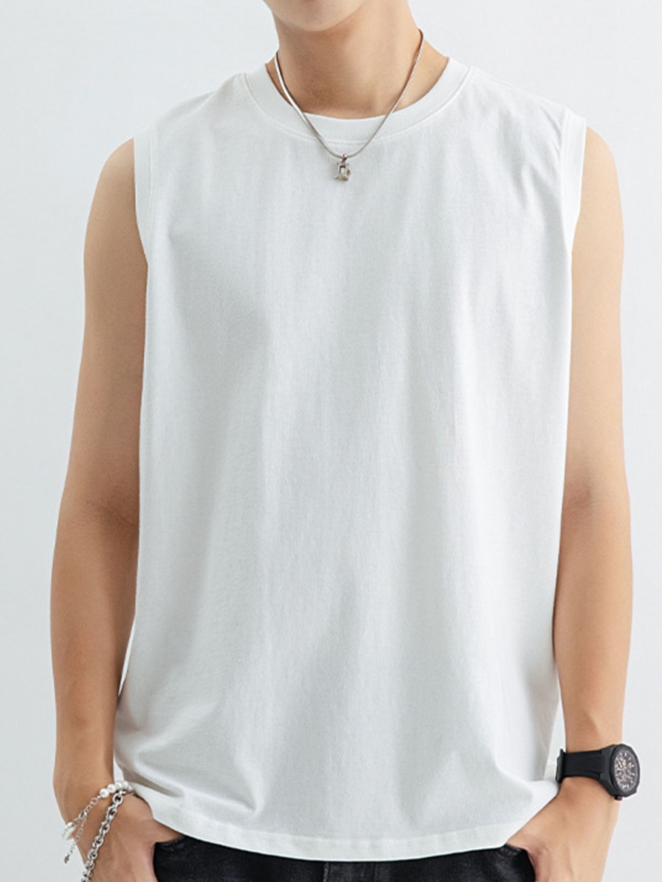 Men's white cotton tank top with crew neck and sleeveless cut