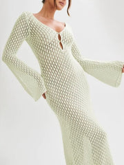 Open-weave maxi cover-up dress in light green with button detail and bell sleeves.
