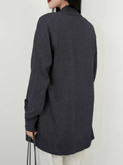 Dark gray textured knit open-front cardigan with pockets and ribbed cuffs.