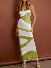 Geometric knit maxi slip dress in white, green, and pink abstract pattern.