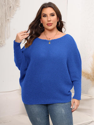 Royal blue ribbed knit off-shoulder sweater with batwing sleeves.
