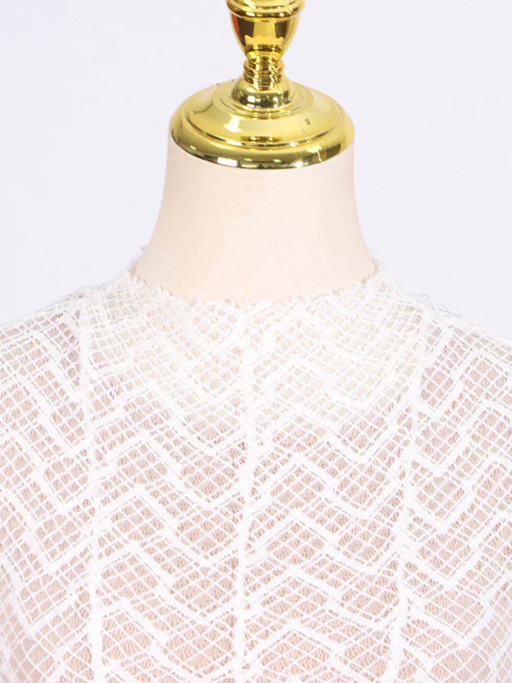 White lace maxi dress with mock neck and chevron pattern detail
