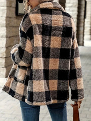 Cozy Sherpa trench coat in camel and black plaid with classic collar and button details.