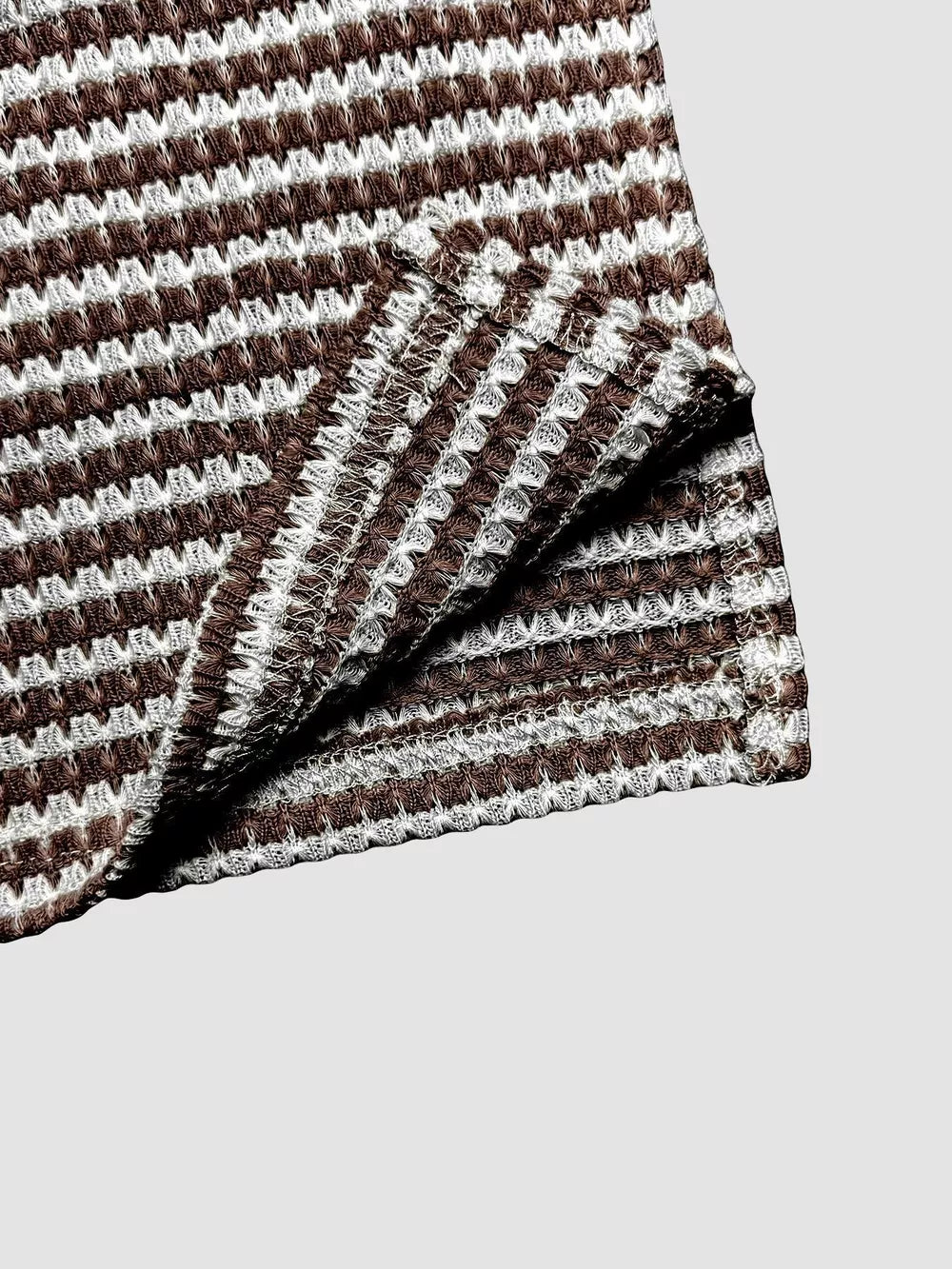 Maternity wide leg pants in dark brown and white waffle knit stripe fabric.
