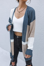 Geometric panel knit cardigan in blue, khaki, and white colorblock.