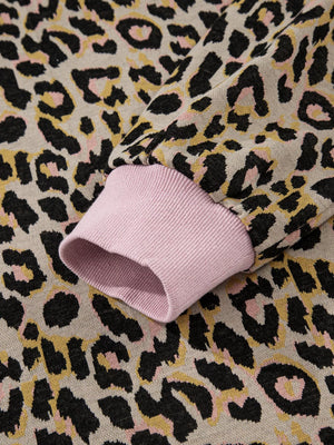 Cozy leopard print loungewear set with pink ribbed cuffs and neckline detail.
