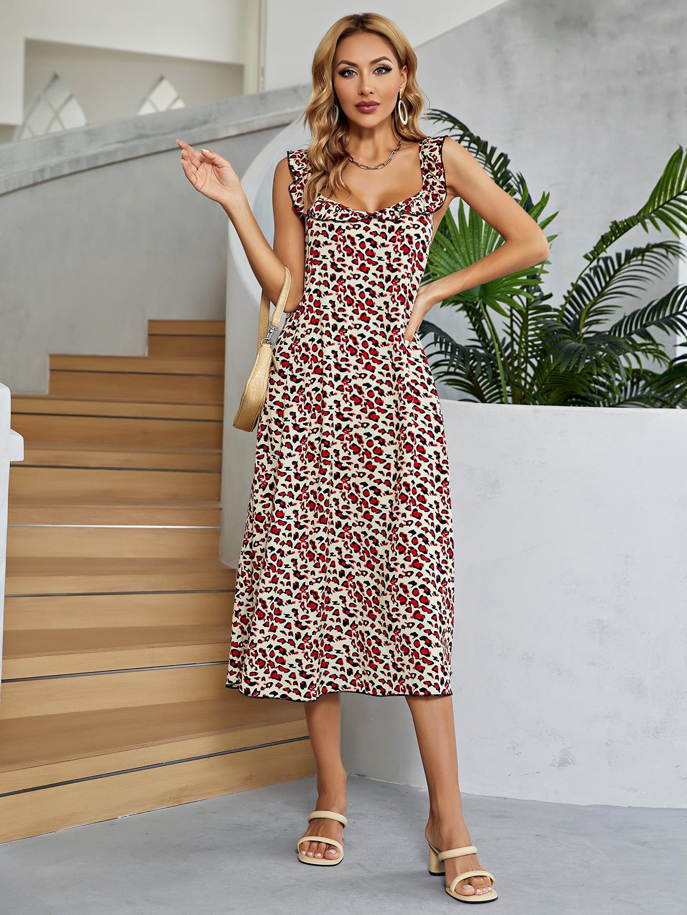 Leopard print midi dress in deep red with ruffle straps and a sweetheart neckline.