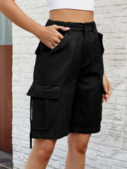 Black denim Bermuda shorts with cargo pockets and button closure.