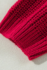 Deep red acrylic knit sweater with ribbed texture detail