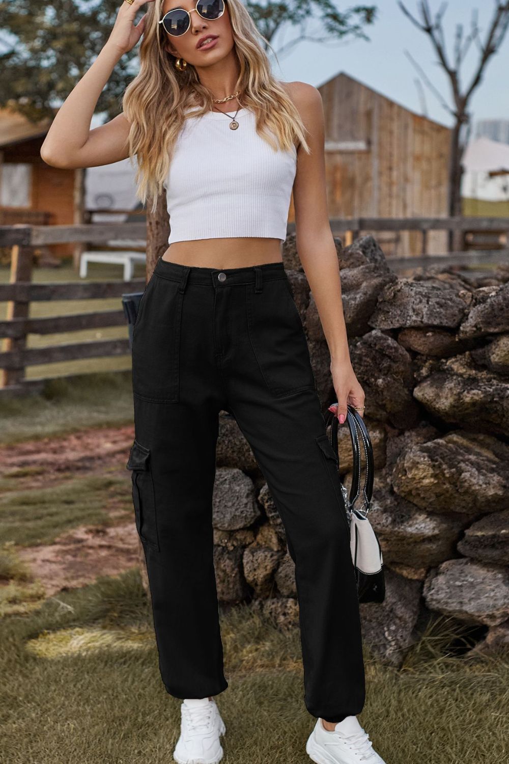 Black cargo pants with utility pockets and a relaxed fit.