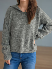Textured knit polo sweater in dark gray acrylic with a relaxed fit and ribbed hem.