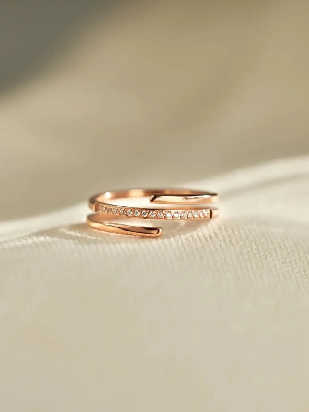 Rose gold double band open ring with pave zirconia detail