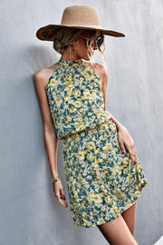 Yellow green floral halter neck mini dress with smocked waist