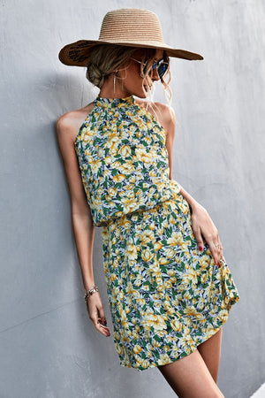 Yellow green floral halter neck mini dress with smocked waist