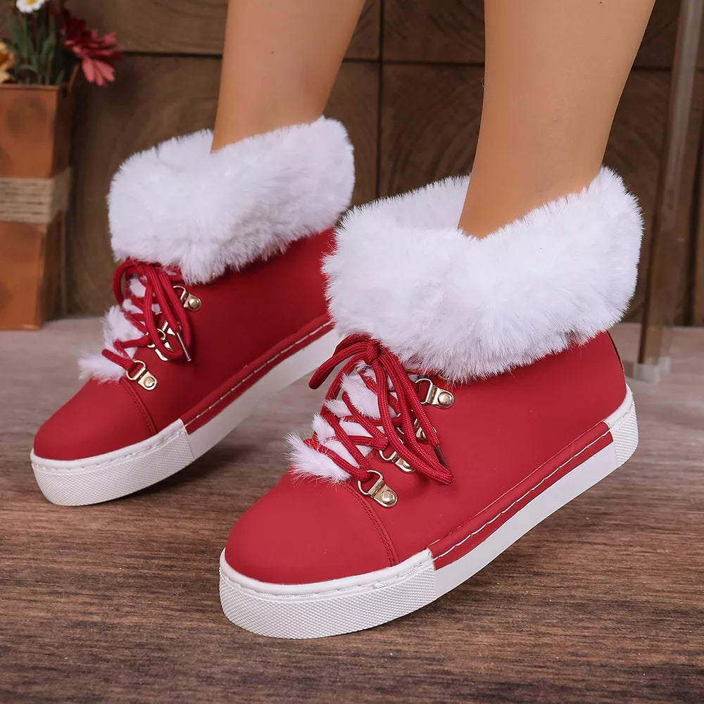 Red fluffy cuff round-toe platform boots with white laces and contrasting sole.