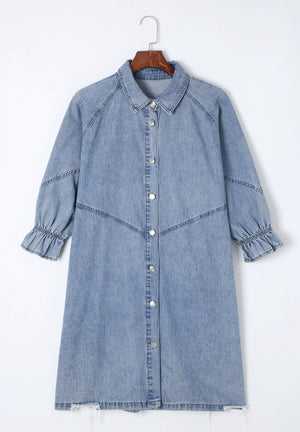 Light blue denim shirtdress with button front, ruffled cuffs, and A-line cut.