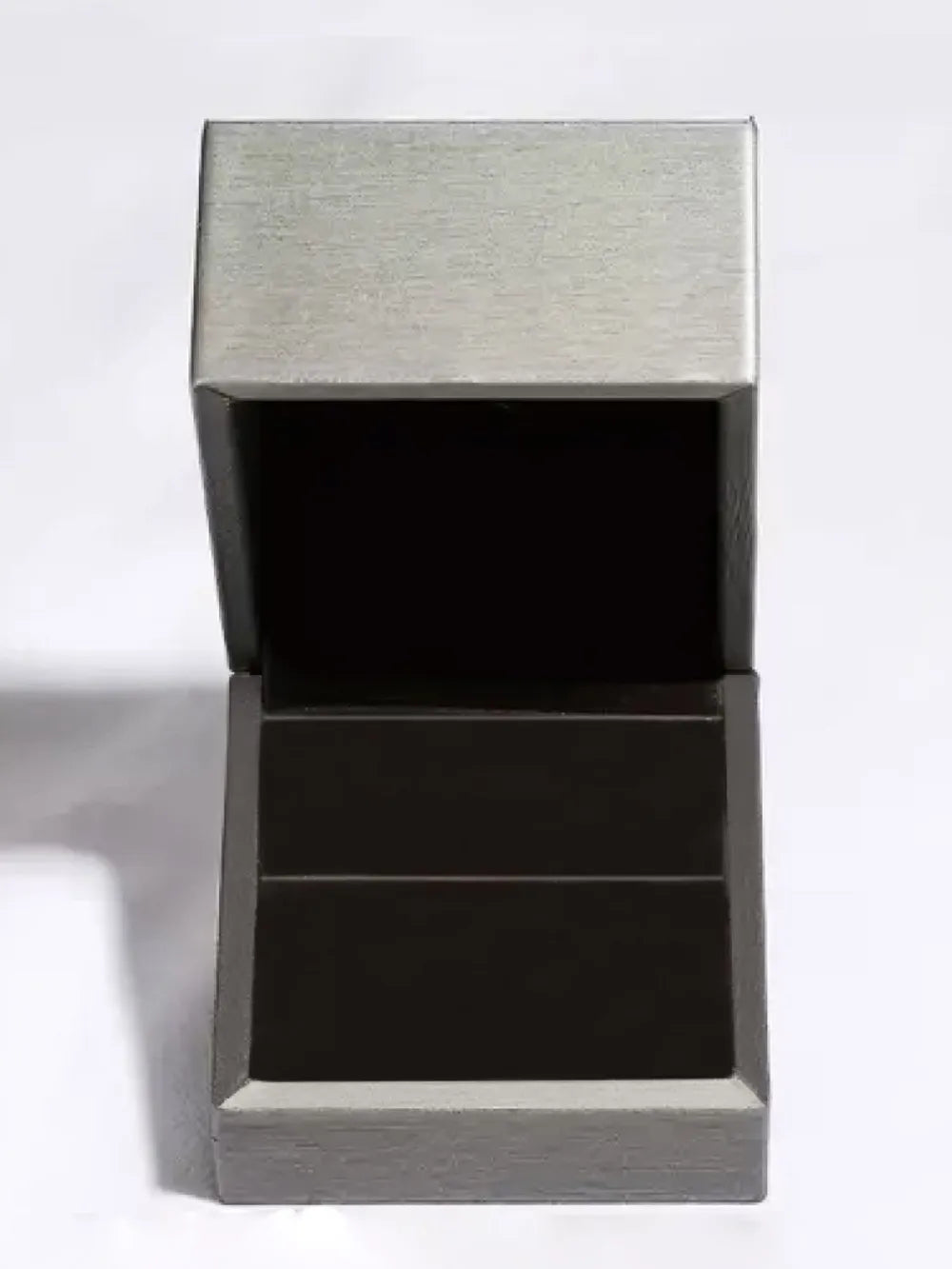 Geometric moissanite drop earrings gift box with brushed silver lid and dark interior