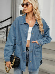 Oversized medium wash denim trucker jacket with hood, button front and chest pockets.