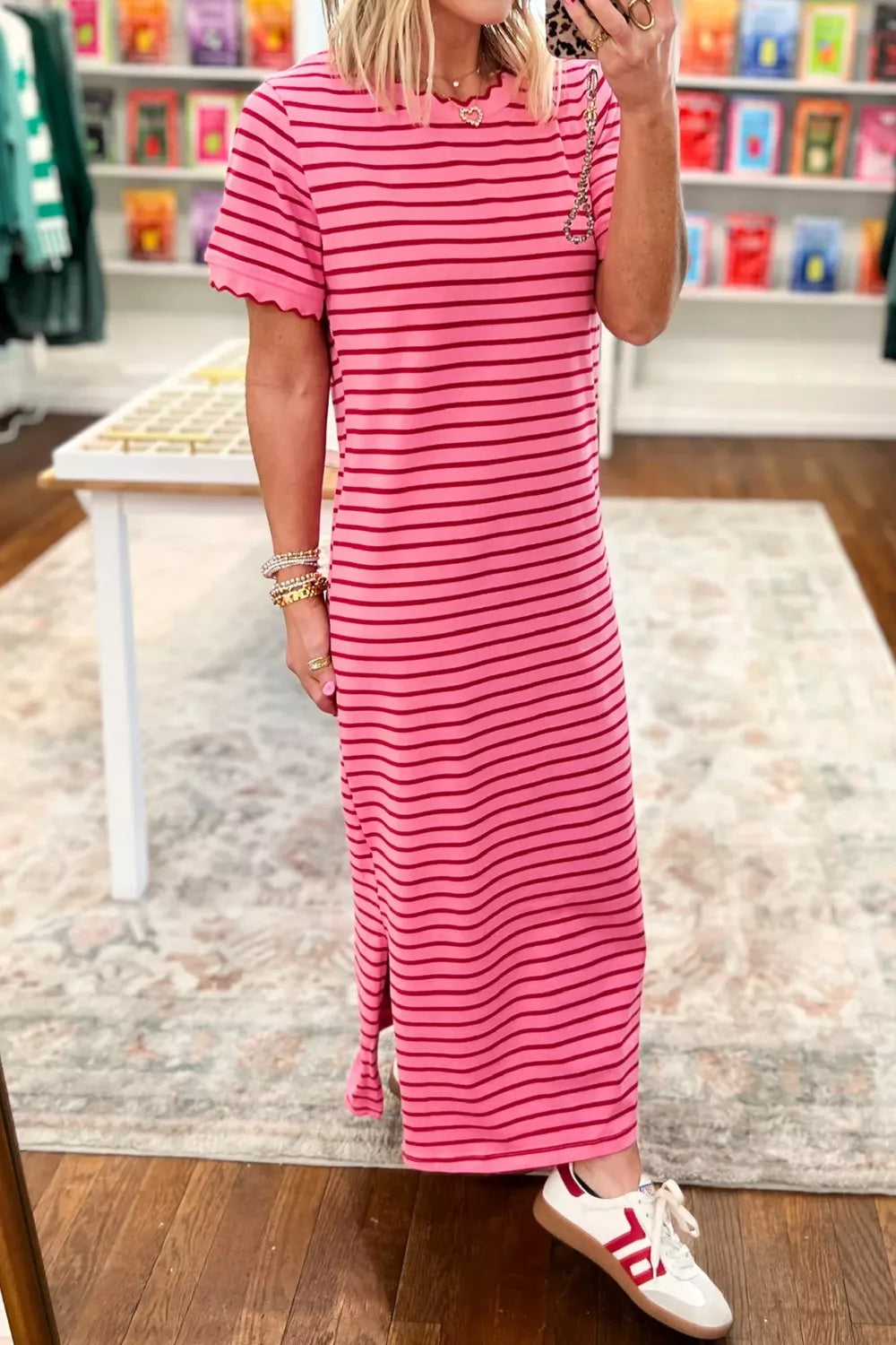 Pink striped maxi tee dress with scalloped trim and short sleeves.