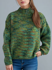 Dark Green textured mélange mock neck acrylic sweater with a relaxed fit.