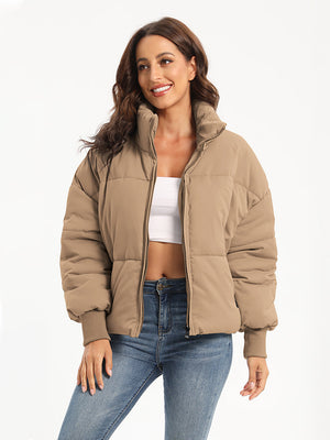 Camel padded bomber jacket with ribbed cuffs and a zip front.