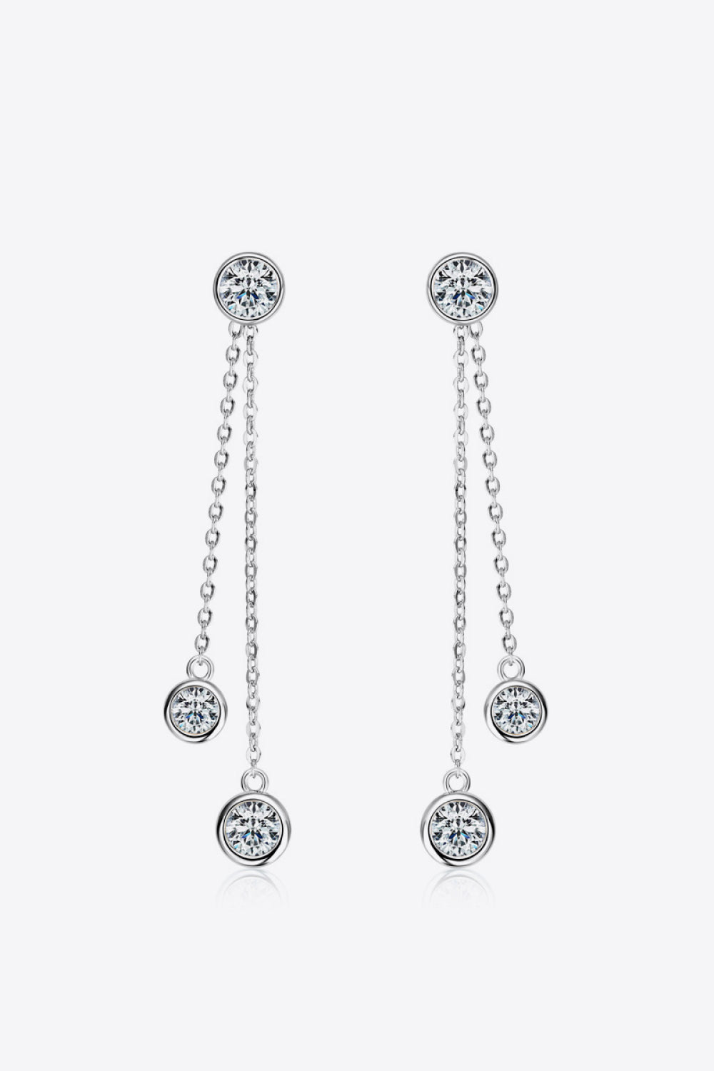 Silver cascade diamond drop earrings with chain accents and cubic zirconia stones.