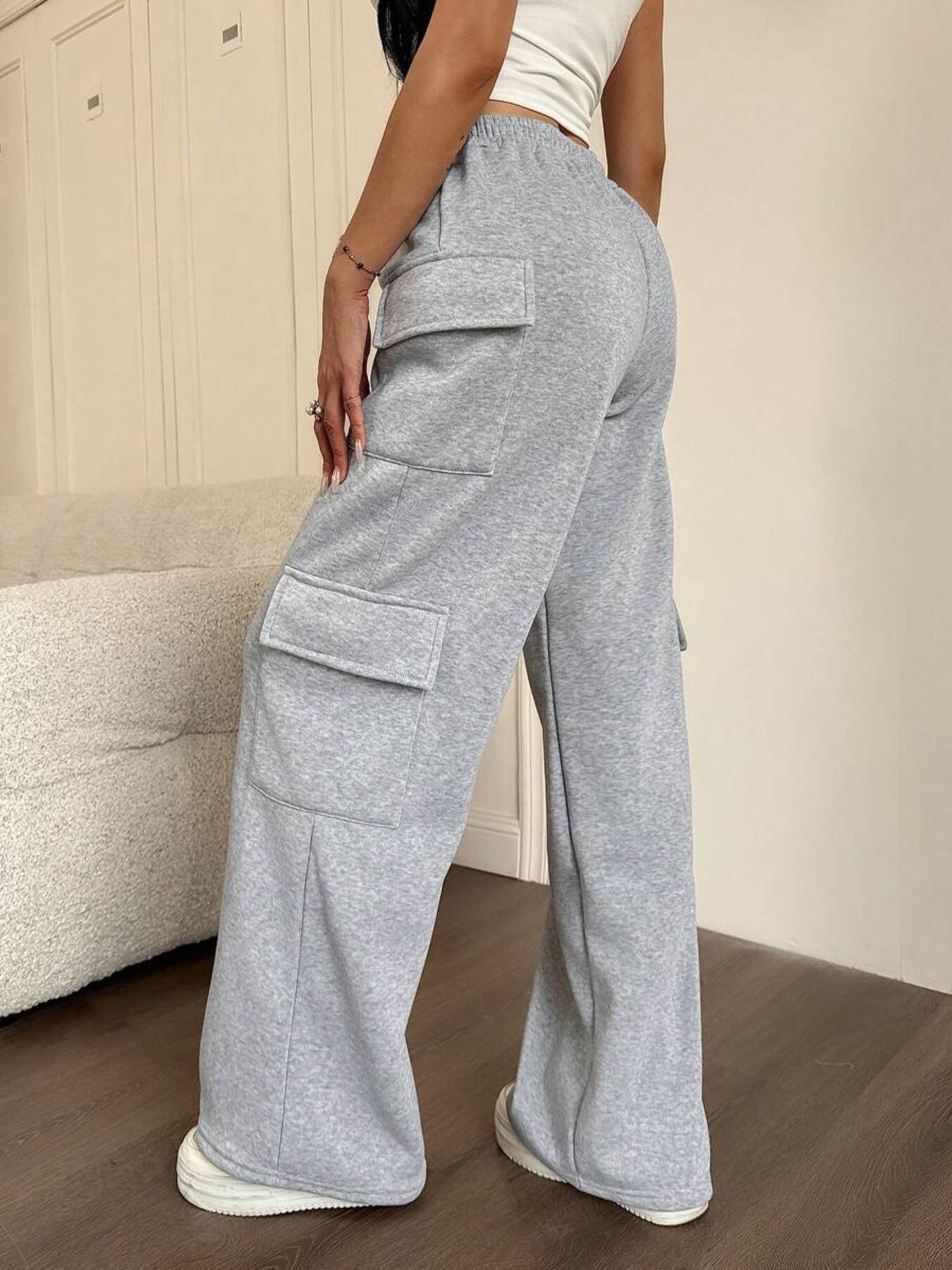 Gray relaxed fit cargo pants with drawstring and large side pockets