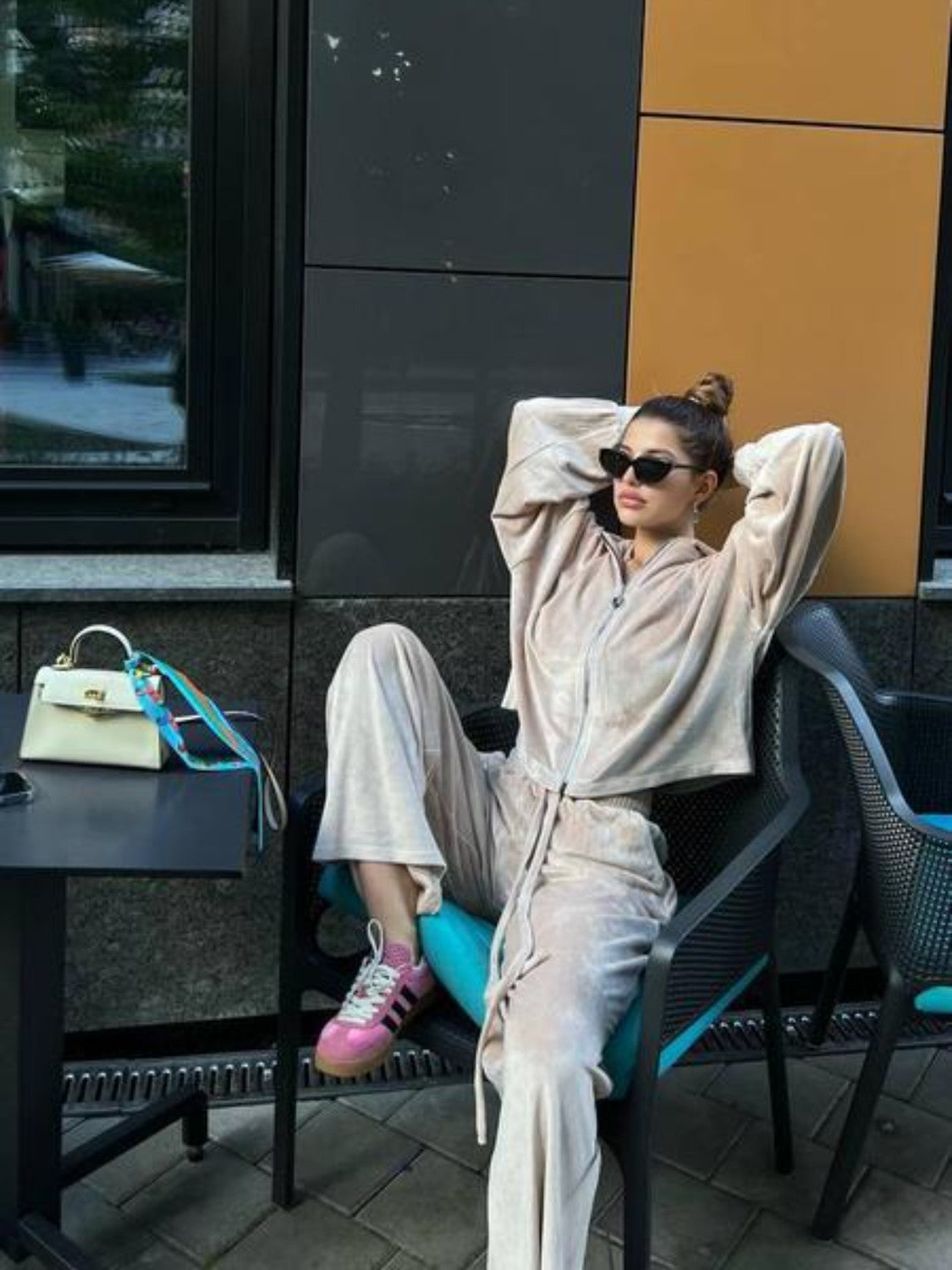 Plush velour lounge set in Sand, featuring wide leg pants and a zip-up hoodie.