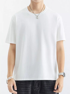 Men's white cotton crewneck t-shirt with short sleeves, a relaxed fit, and a simple design.