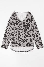Relaxed fit leopard print v-neck top in dark gray with long sleeves.