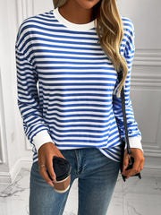 Horizontal stripe crewneck sweatshirt with cuffs in royal blue and white, featuring long sleeves and ribbed cuffs.