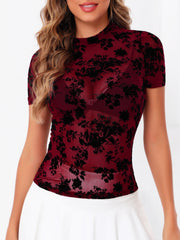 Burgundy velvet floral mesh mock neck top with short sleeves.