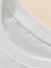 White cotton toddler tee neckline detail with visible stitching