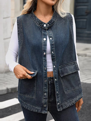Blue denim vest with band collar, button front, and two chest pockets.