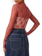 Burgundy lace illusion mock neck top with long sleeves and a ribbed inset detail.