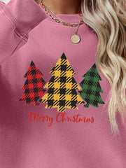 Plaid tree graphic crewneck sweatshirt in pink with Merry Christmas text.
