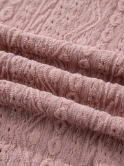 Pink eyelet embroidered blouse with textured fabric detail