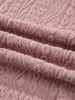 Pink eyelet embroidered blouse with textured fabric detail